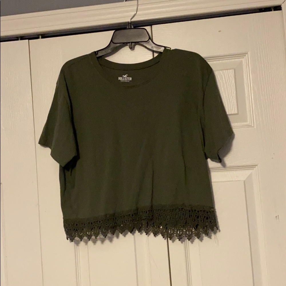 olive green shirt w/ lace trim at bottom